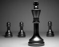 750px-Chess king and pawns.jpg