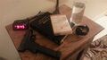 Gun and bible on nightstand.jpg