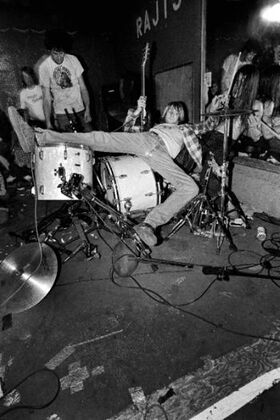 Kurt cobain destroys drums.jpg