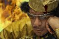 Muammar Gaddafi plays chess in hell.jpg