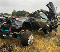 Lifted-truck-flipped-wrecked-12.webp