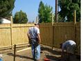 2 guys building a fence.jpg