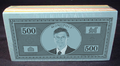Monopoly money stack.png
