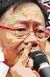 Wong Yuck-man picking nose.JPG